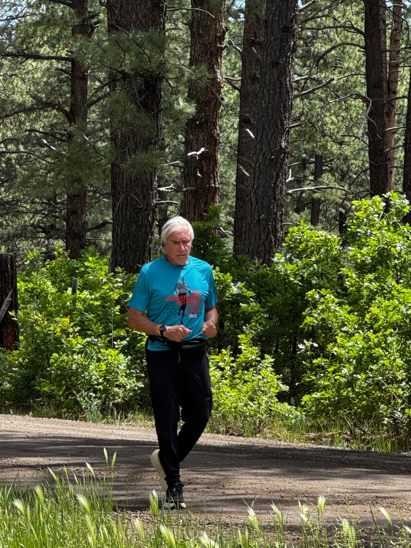 Dr. Larry Grogin runs in Pagosa Springs recently as part of his quest to run 100 marathons in 100 days to raise awareness for Parkinson&rsquo;s disease, which he was diagnosed with in 2019. Grogin ran three marathons in the Pagosa Springs area.