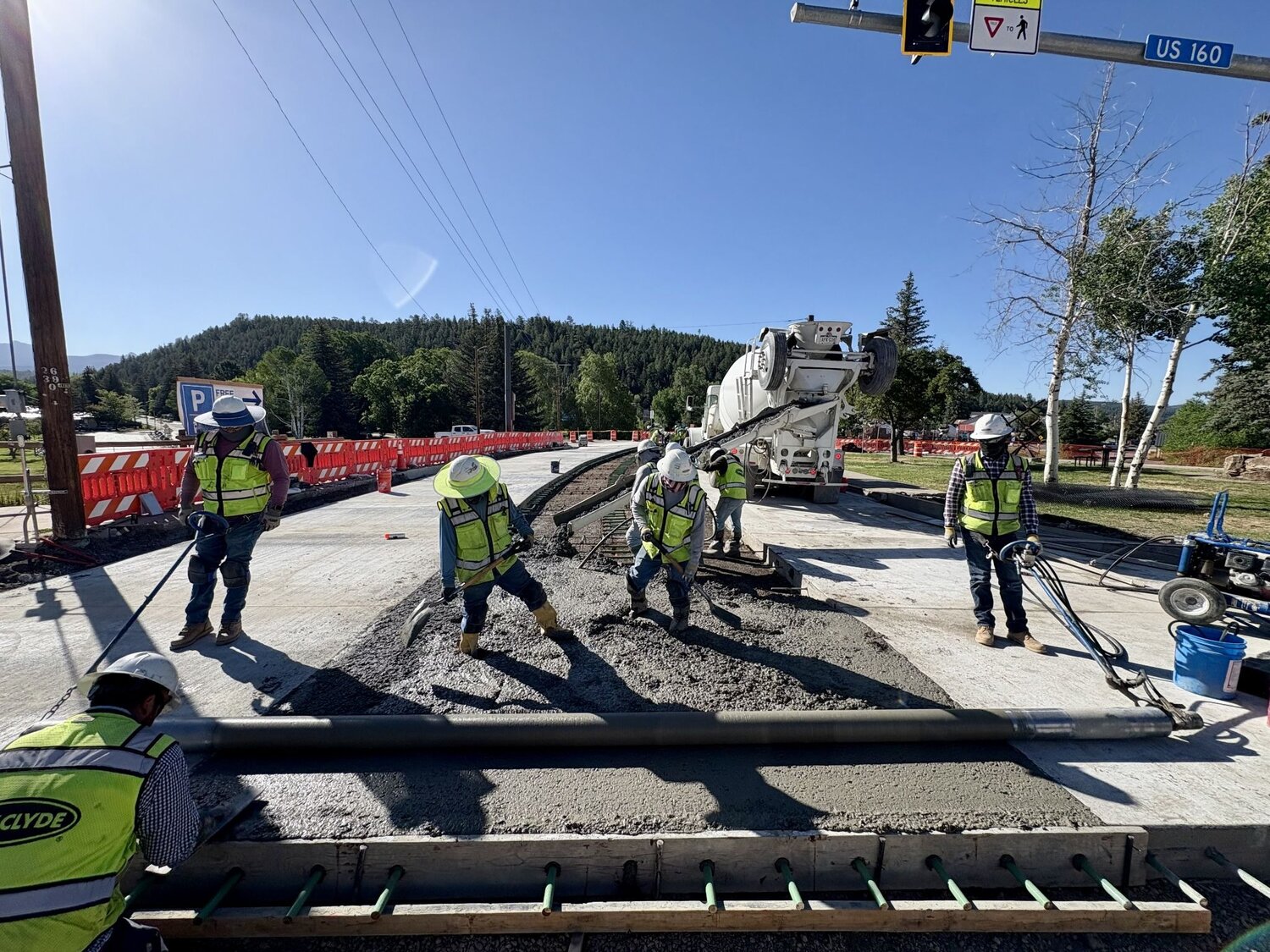 U.S. 160 reconstruction personnel work to pave the Hot Springs Boulevard intersection. Paving operations at the intersection are anticipated to be completed by the end of the day on Thursday, June 18, allowing for the reopening of Hot Springs Boulevard to traffic, as well as open the overlook parking lot.