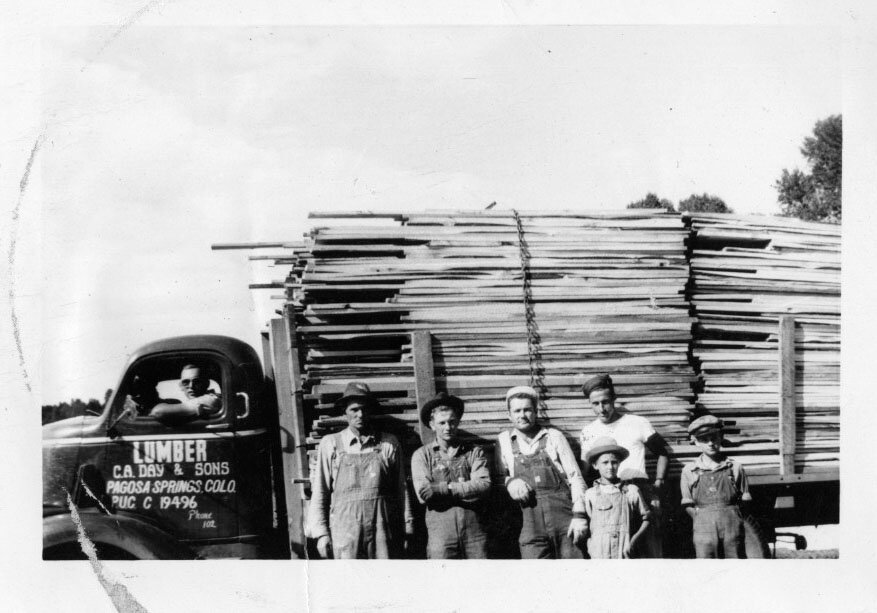 Day Lumber hauls a load of lumber in Pagosa Springs, driven by Paul Day.
