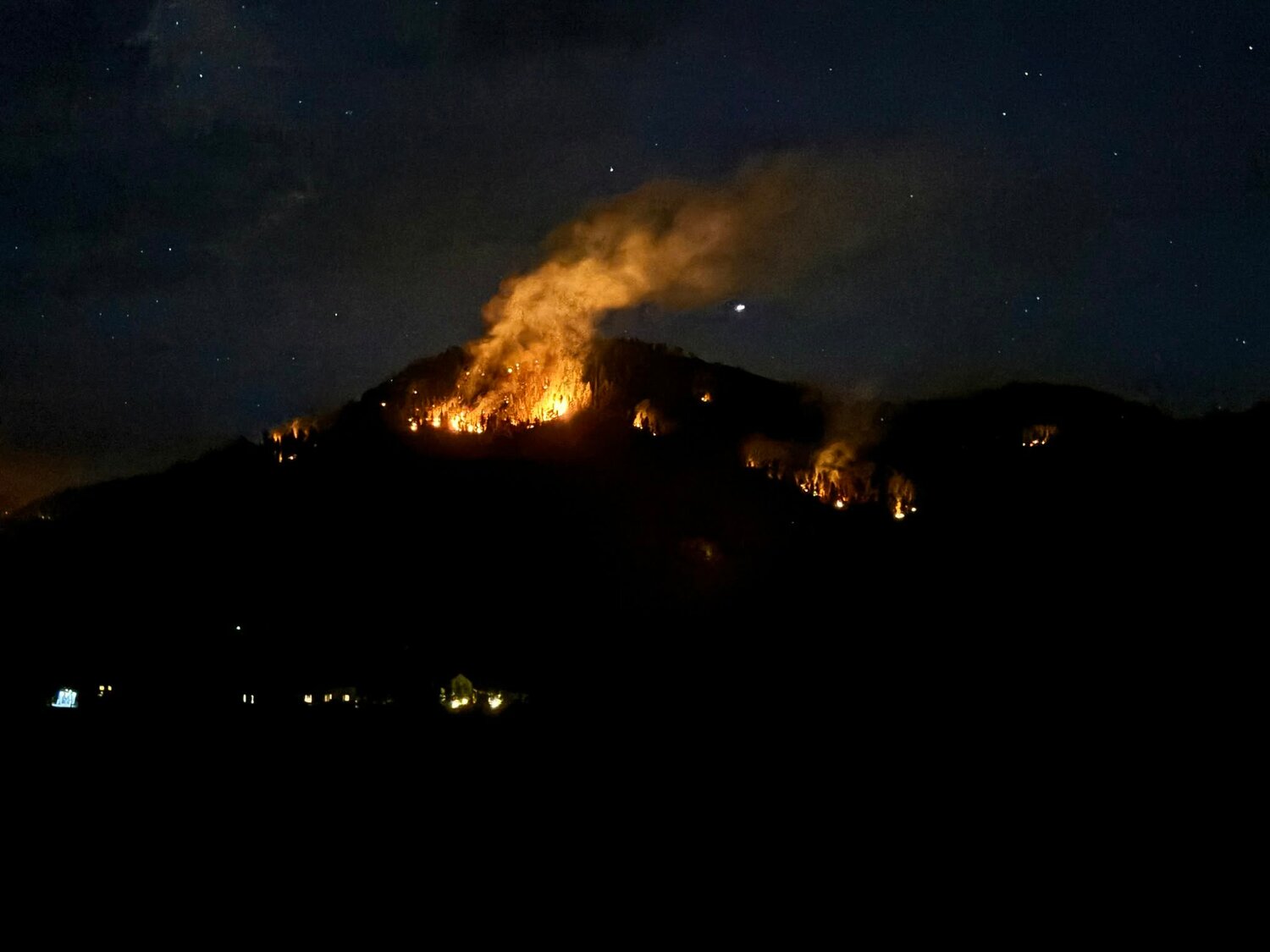 The fire is seen the night of Aug. 1.