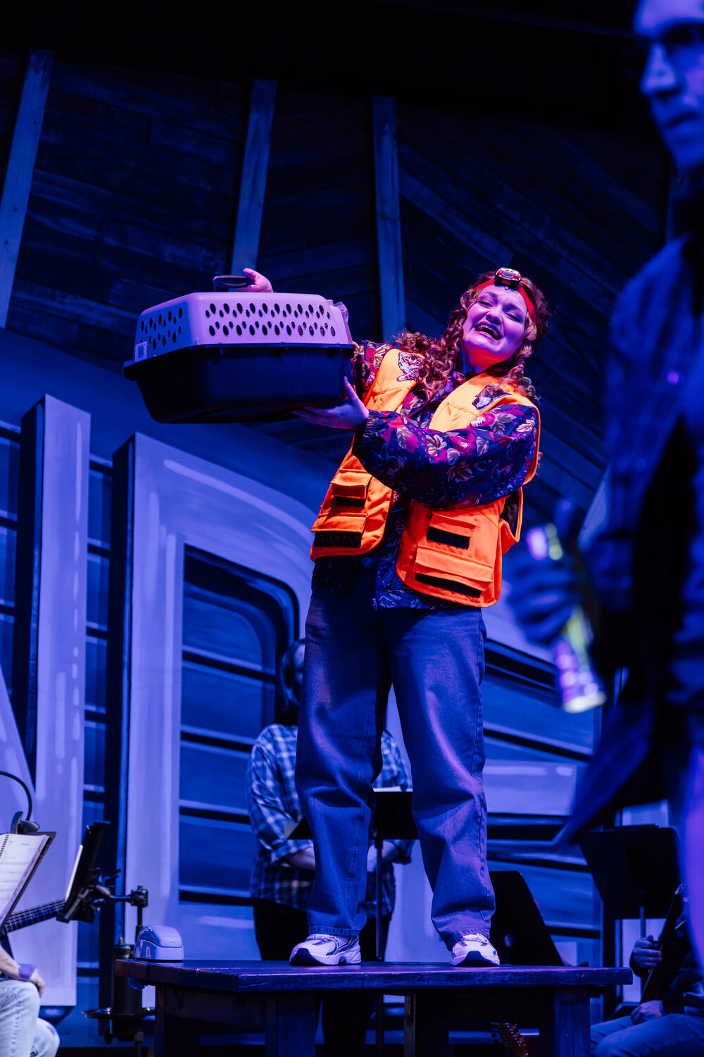 Sydney Hoel, as Bonnie, helps care for animals stranded aboard planes diverted to Newfoundland following the attacks of Sept. 11, 2001, in Thingamajig Theatre Company&rsquo;s production of &ldquo;Come From Away&rdquo; (returning next week, Aug. 13).