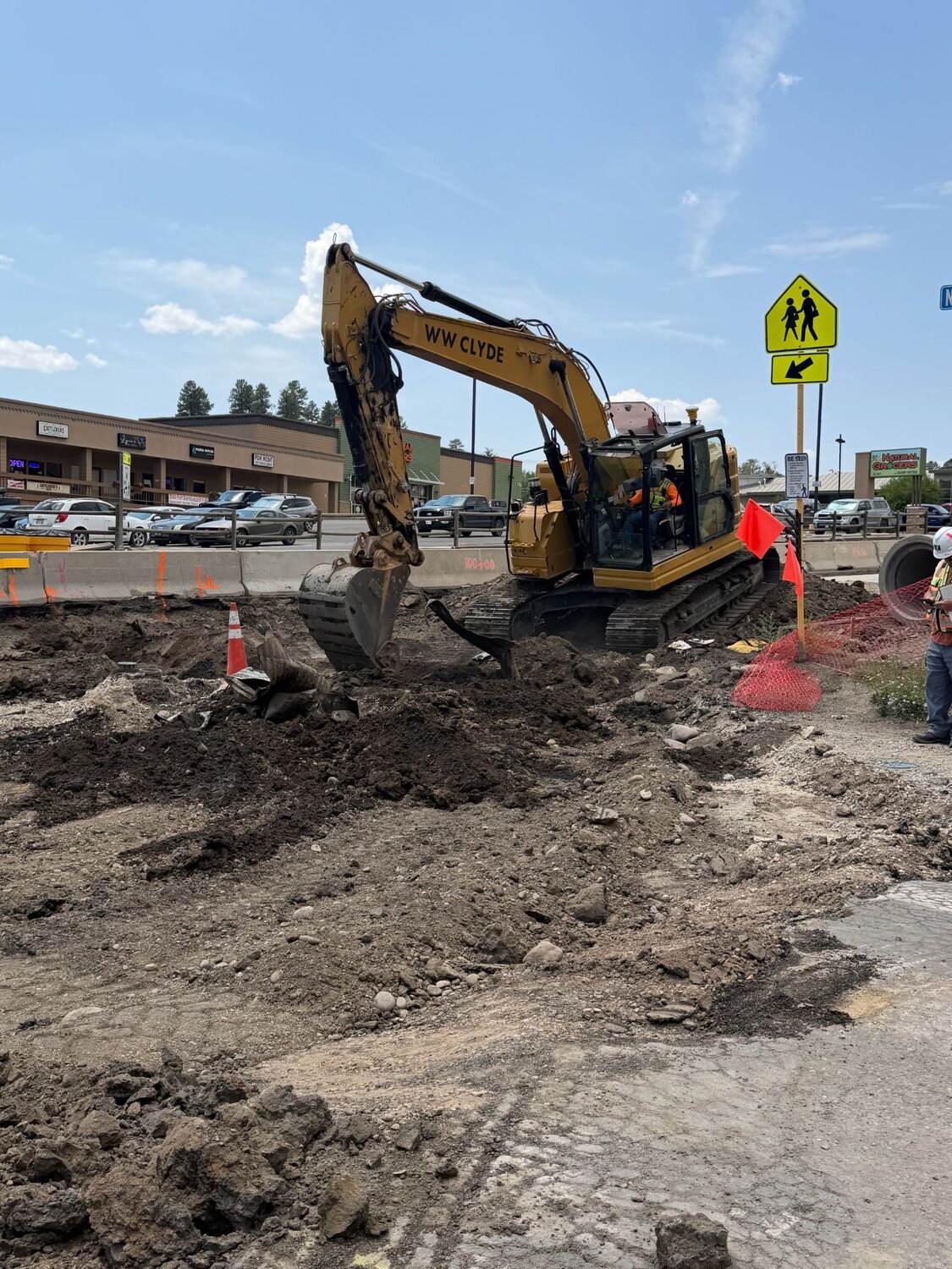 Crews continue exploratory work on the north side of the 7th Street intersection, identifying areas for stormwater utility upgrades.