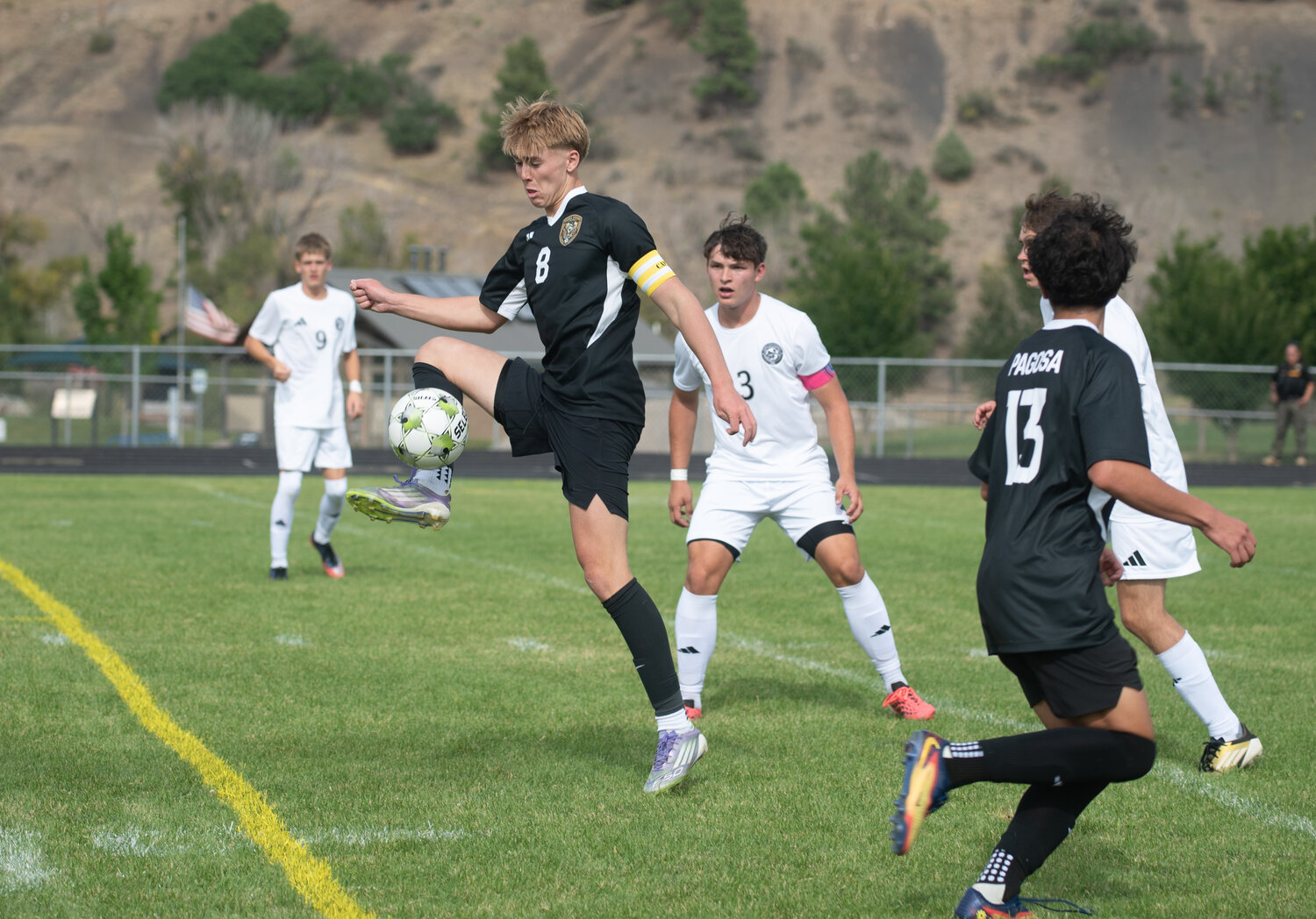 Pirate Ryder King works to control the ball during the team&rsquo;s season opener against Piedra Vista on Aug. 27. King notched one goal in the matchup.