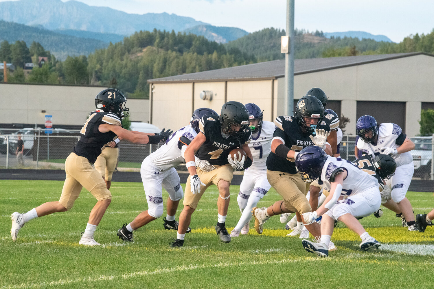 Pirate running back Alex Pacheco breaks away from a Salida defender while rushing the ball during Pagosa&rsquo;s matchup against the Spartans on Friday, Aug. 28. Pacheco led the Pirates in rushing yards on the night, racking 217 yards and three touchdowns on 14 carries.