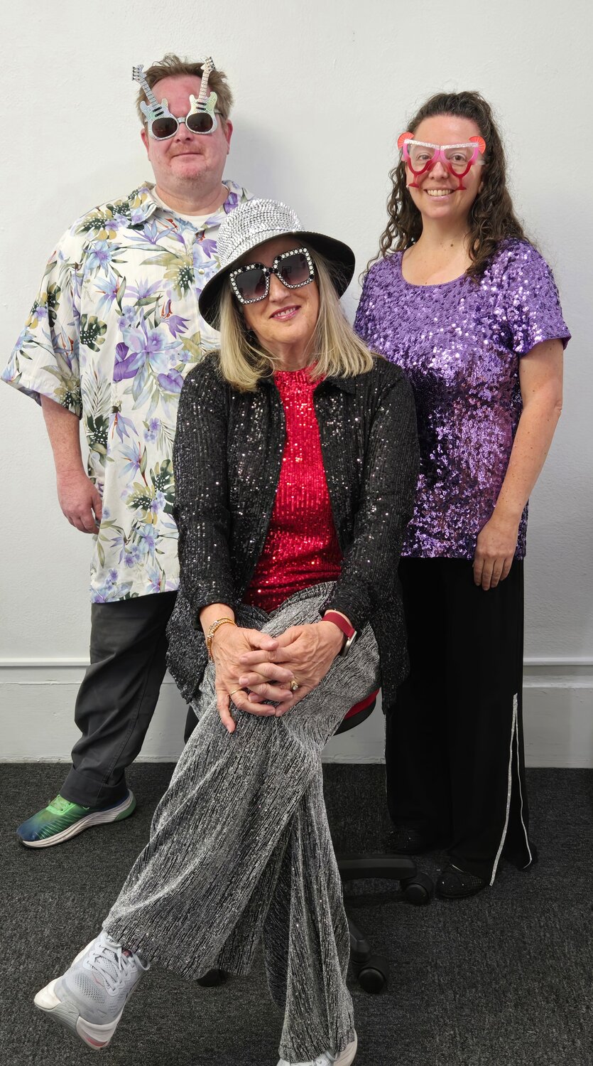 Team Madame Sparkle Pants will be shining and sparkling down the runway on Oct. 3 for Runway for Rise. Grab your tickets now and watch their team light up the runway. Pictured, left to right, are Drake Stewart, Lauri Heraty and Robin Curvey.