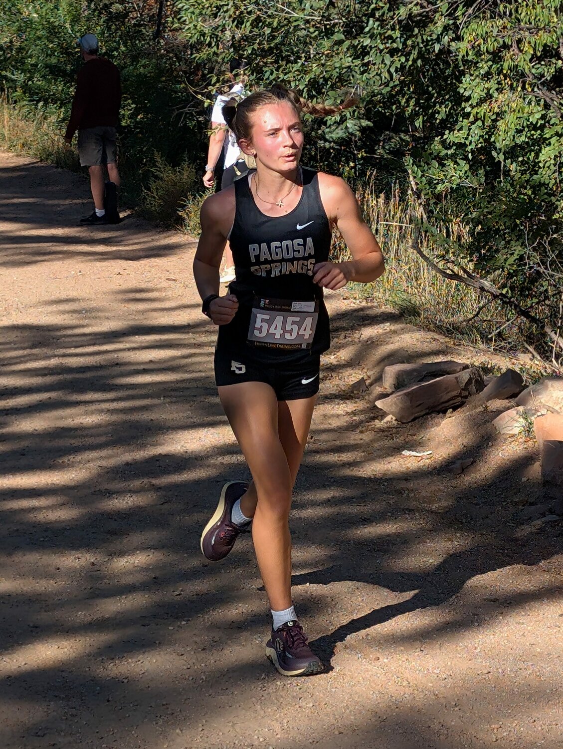 Bella Jackson helps her team to a second-place finish at the Coronado Cougar Classic in Colorado Springs on Saturday, Sept. 19, with a 14th-place individual finish.