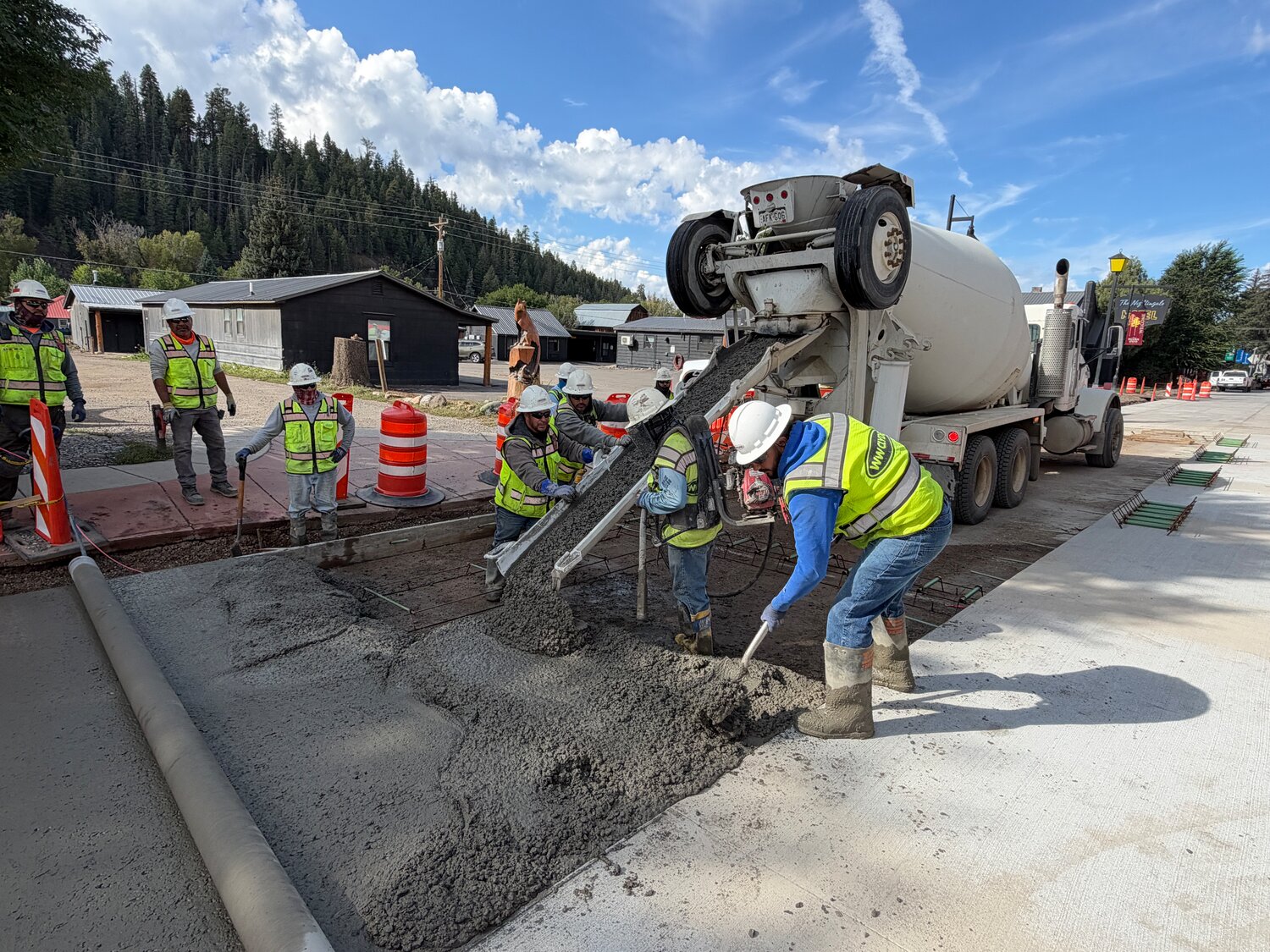 Crews pour and form the commercial vehicle parking area in front of Memory Lane and Pagosa Photography. This driveway will be used for deliveries only.