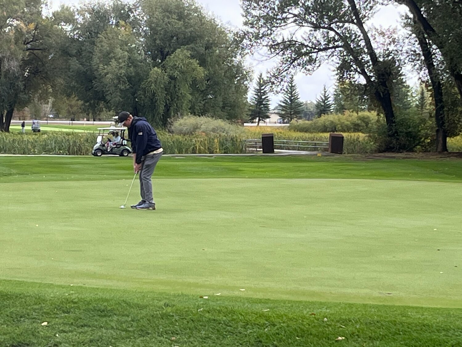 Pirate Treyson Cotts putts on hole nine at the Intermountain League Championship in Alamosa on Thursday, Sept. 24. The Pirates finished third at the tournament.