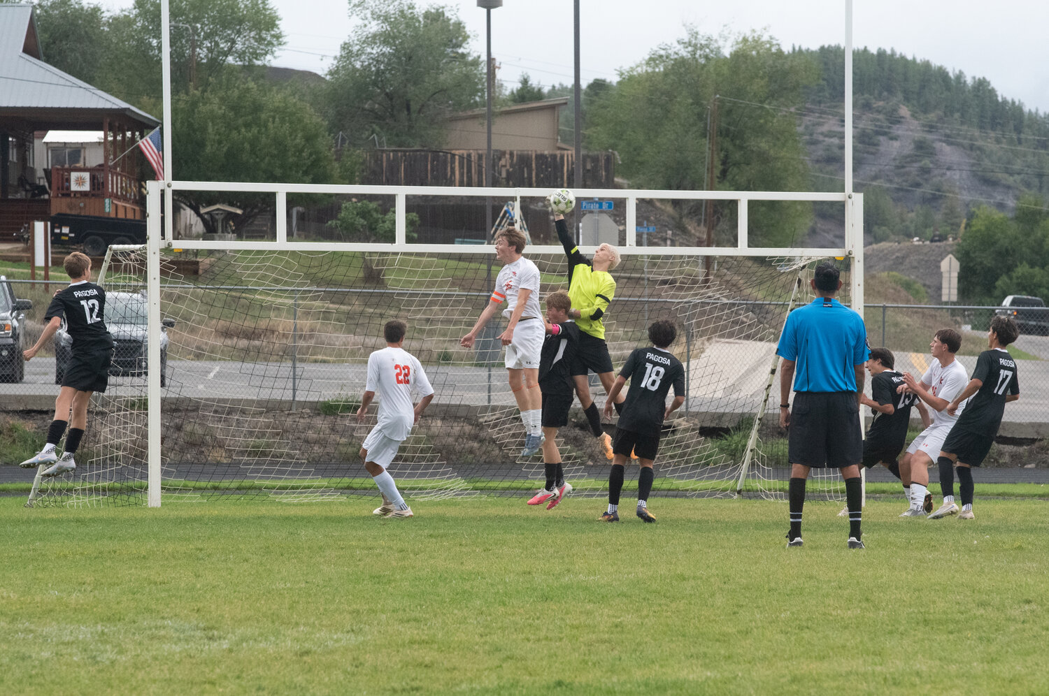 Pirate keeper Ethan Bracken punches the ball away in the team&rsquo;s matchup with the Montezuma-Cortez Panthers on Thursday, Sept. 24. The Pirates lost 2-1.