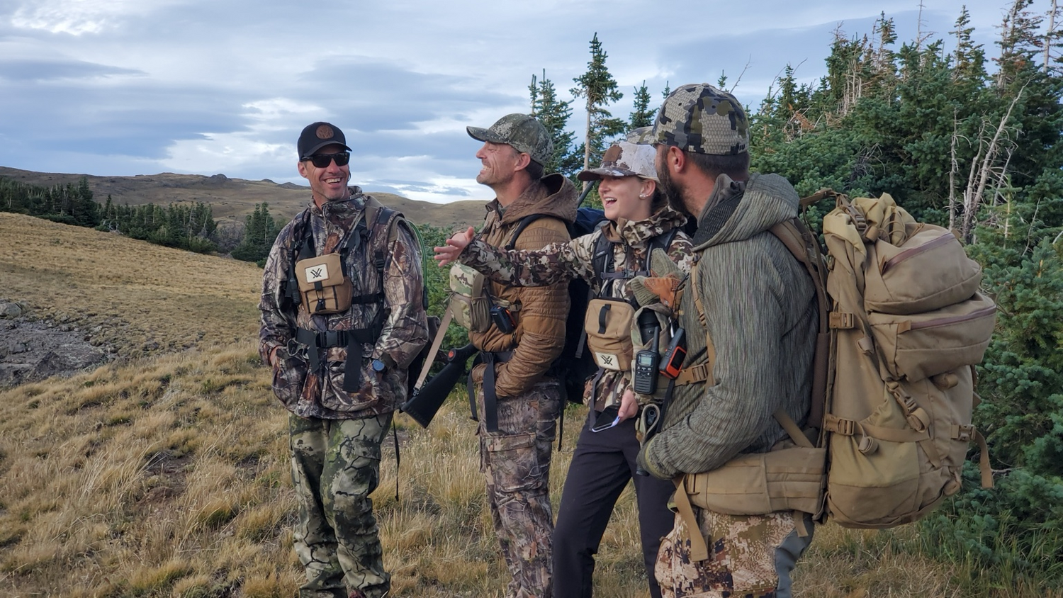 Noella Sarnow, 17, poses with the Rocky Mountain bighorn ram she harvested and is pictured during her hunt. Sarnow&rsquo;s hunt was a story of family history, friendships and sharing hunting with new generations.