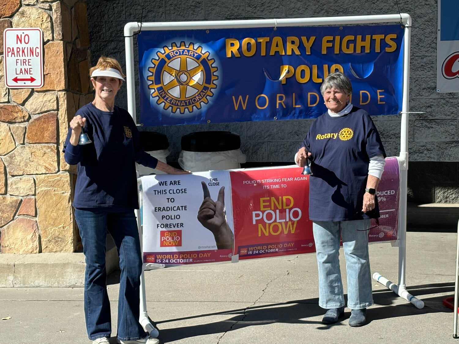 Rotary Club members will be ringing bells on World Polio Day, Saturday, Oct. 24, at City Market to inspire local generosity in the effort to end polio worldwide. Pictured are Rotarians Pat Love and Melanie Garrett during a previous fundraiser.