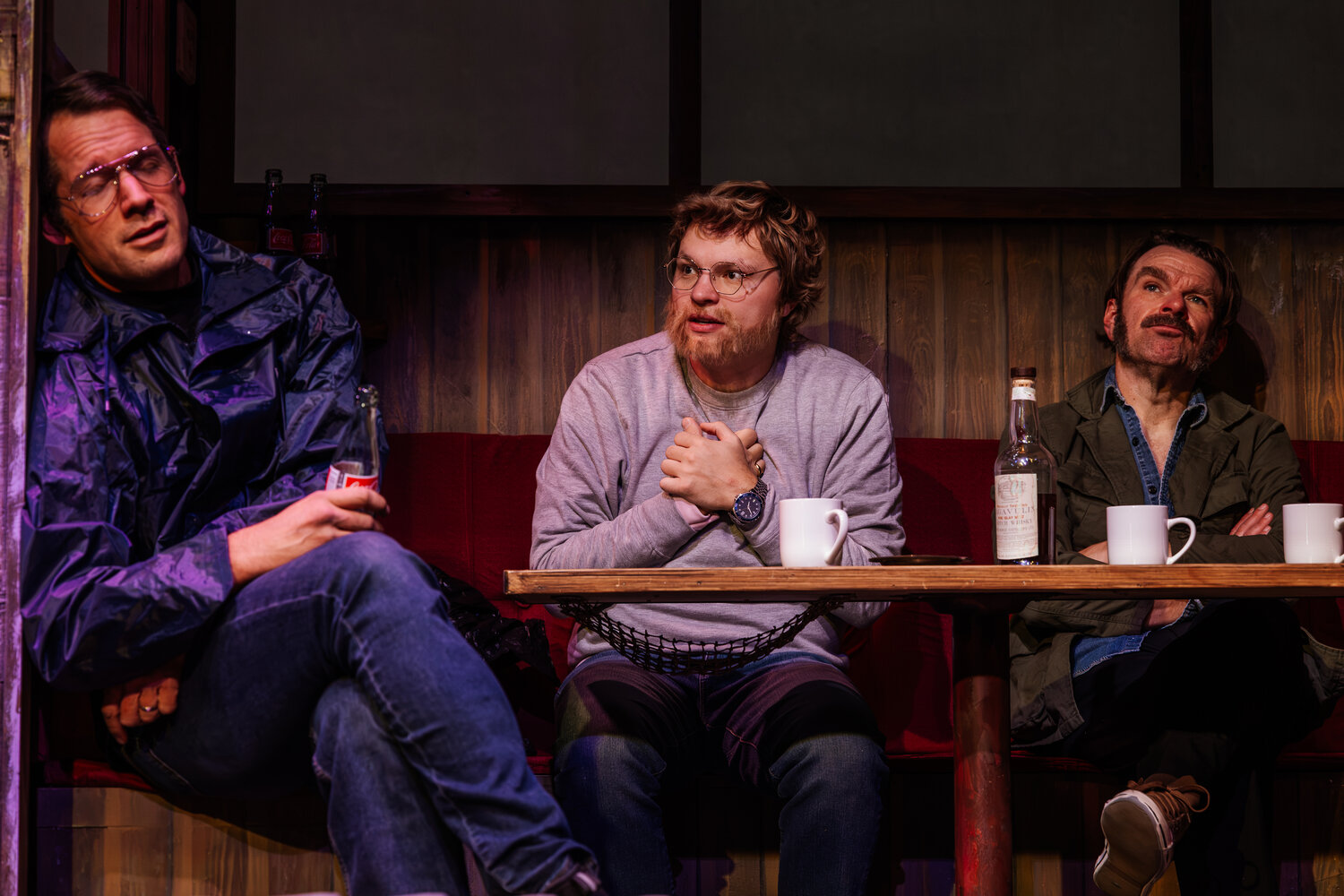 From left are Scott Morehead as Roy Scheider, Cameron Vargas as Richard Dreyfuss and Tim Moore as Robert Shaw aboard the Orca in Thingamajig Theatre Company&rsquo;s production of &ldquo;The Shark is Broken&rdquo; at the Pagosa Springs Center for the Arts.