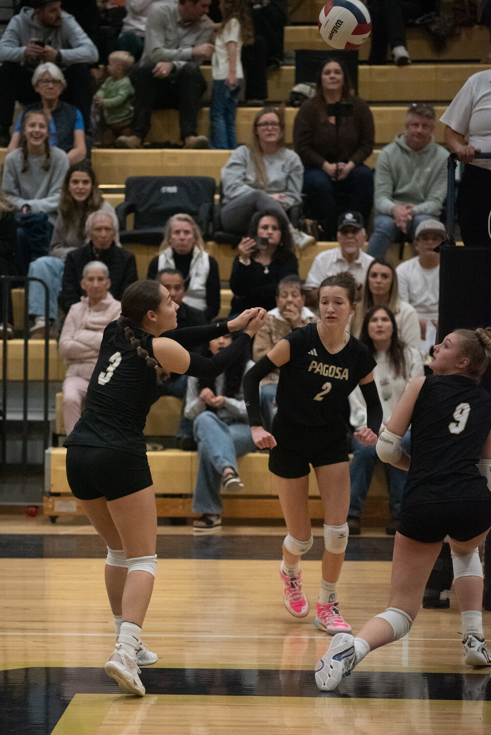 Lady Pirate Liana Vega bumps the ball into the Ignacio Bobcat territory during the Lady Pirates&rsquo; final home game of the season on Monday, Oct. 26.