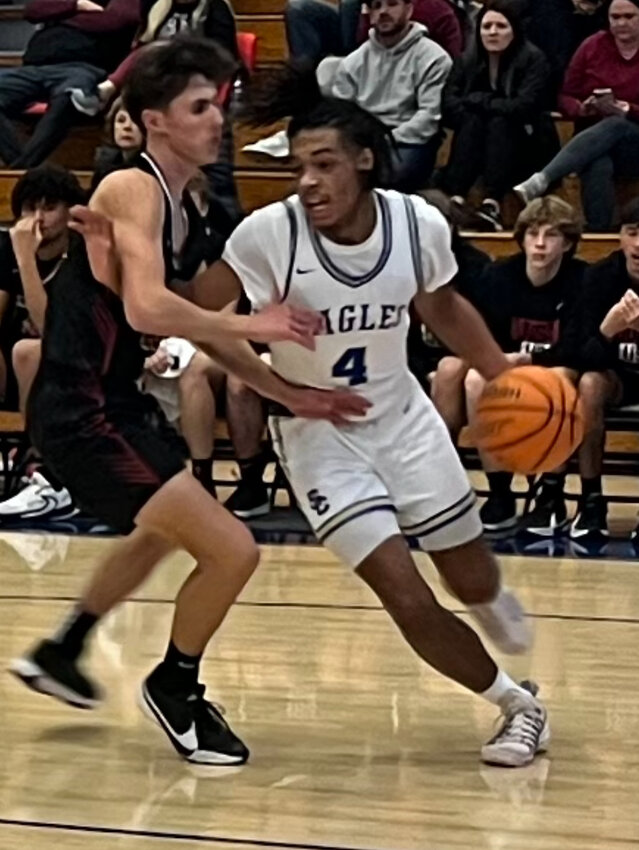 Kyler Trice (4) drives to the basket during his senior season in 2023-24.