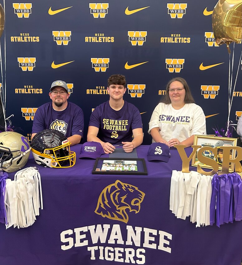 Gage LeMaster with his parents after signing to continue his football career for the Tigers of Sewanee - The University of the South, Sewanee, TN.