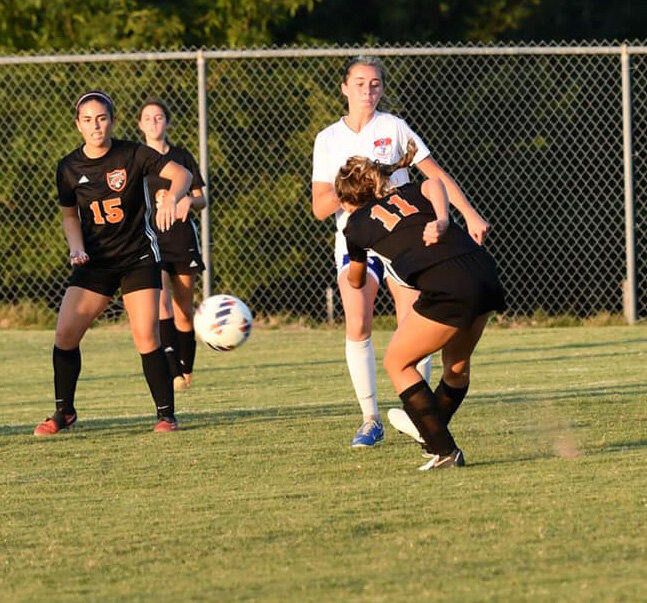 Ella McGeary (11) shoots and scores Cascade's third goal vs Forrest.