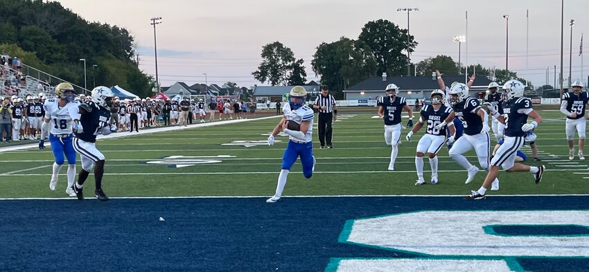 Sophomore QB Stephen Bobo (15) opens the scoring on an 8-yard TD run in the 1Q.