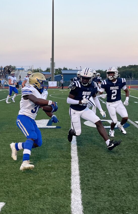 Robert Bailey (31) gets ready to lower the boom on SCHS' opening drive.