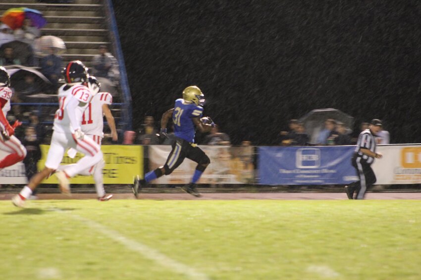 Robert Bailey (31) eclipsed 100 yards on the ground for the 4th time this season against Franklin County.