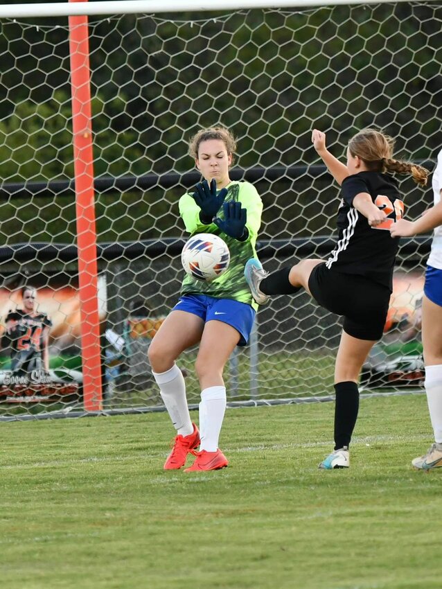 Kyla Pulley (20) has her close-range shot denied by Huntland GK Molly Tipps