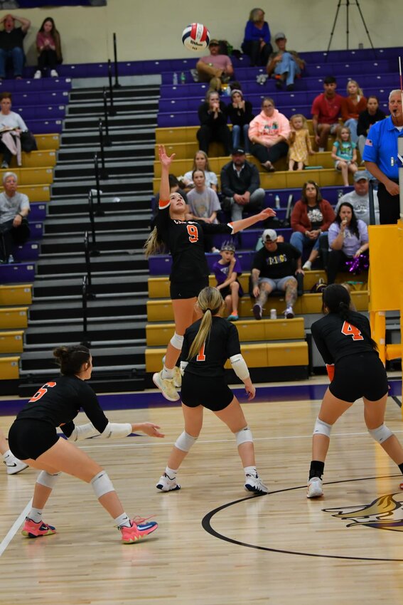 Matalee Keele (9) goes up for a kill in her final game for Cascade on Tuesday.