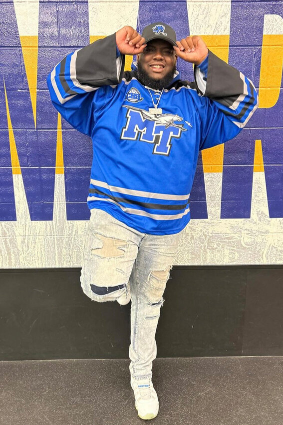 Rapper M.C. D from Nashville Tenn., wears MTSU ice hockey jersey for home opener