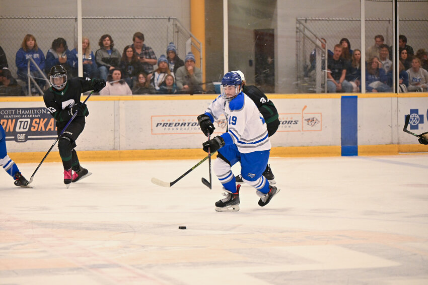 Middle Tennessee State University’s Harvey Rench, a senior from Hendersonville, Tenn., and center for
MTSU’s ice hockey team, controls the puck at the first home game of the season on Sept. 27 against the
University of Alabama-Birmingham at the Ford Ice Center in Antioch, Tenn.