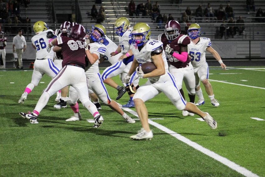 Nate Zimmerman (20) finished with a career-high 3 TDs rushing. He also recovered a Spring Hill fumble