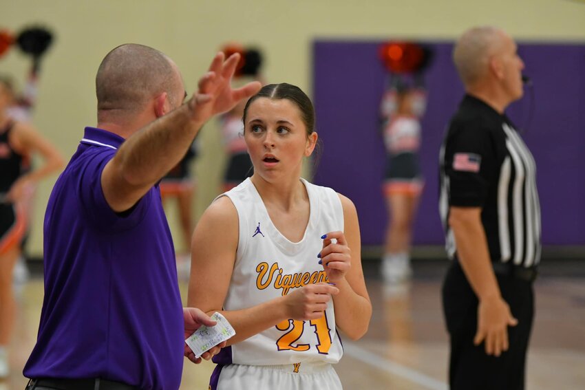 Viqueens' HC Cody Pierce and Sarah Flanagan (21) will be key for Community's postseason success.