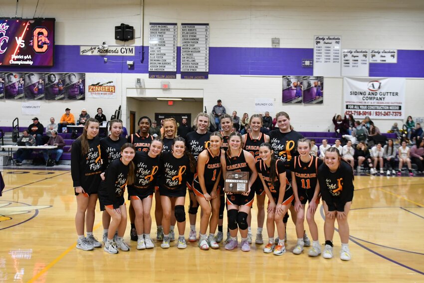 The Cascade Lady Champions holding their District Runners-Up Plaque on Saturday night.