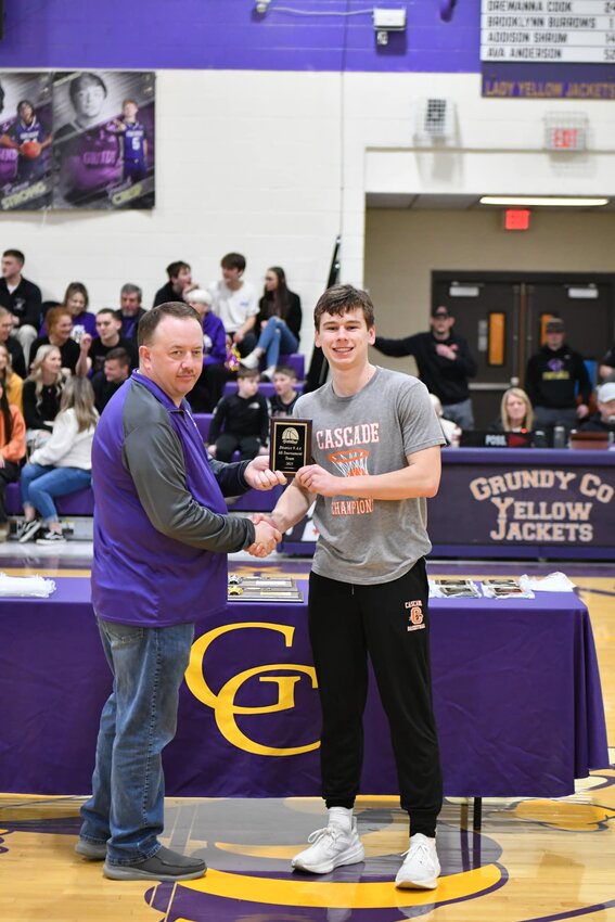 Henry Stone (grey, 10) was named to the District 9-AA All-Tournament game after averaging 8 PPG in the two tournament games for Cascade.