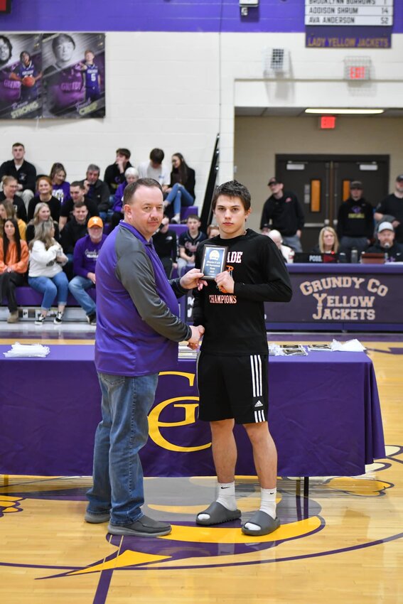 Tyler Rodgers (black, 25) was named to the District 9-AA All-Tournament team after averaging 5.5 PPG in the two games for Cascade. His defense against both Community and Grundy County stood out to the voters.
