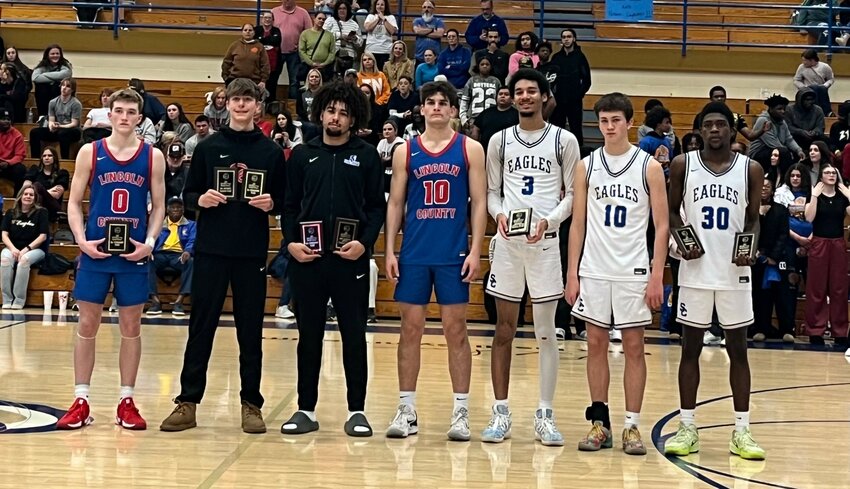 (From left to right) Reese Smith, Cayden Trail, Deashawn Adams, Carson Thompson, Tae'Shawn Shelton, Jack Conditt, and Jevon Lee were named to the Boys 2024-25 District 9-AAAA All-Tournament team.
