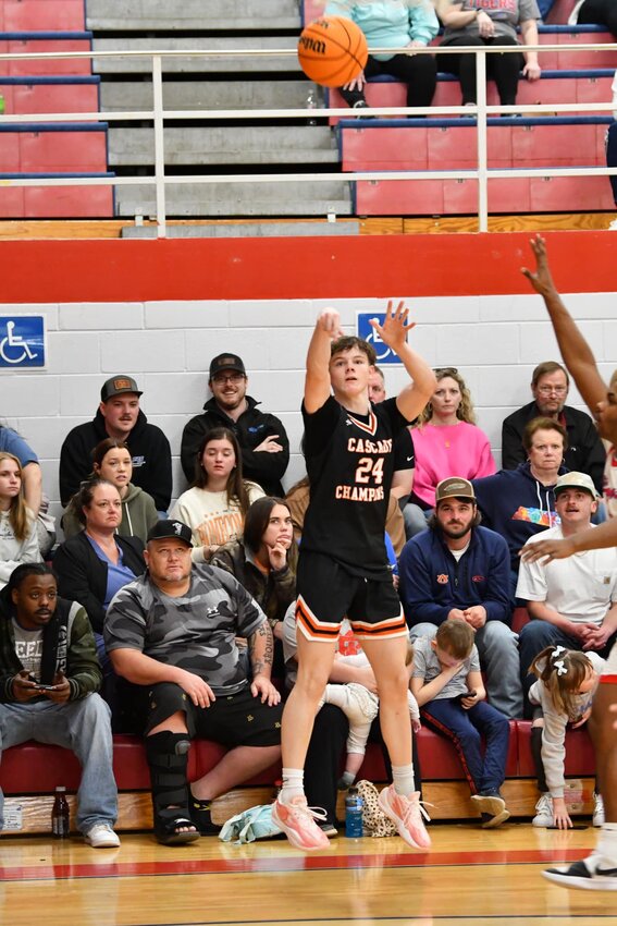Tyler Barrett (24) knocked down four three-pointers and scored a team-high 12 points in Cascade's season-ending loss at Mt. Pleasant on Saturday.