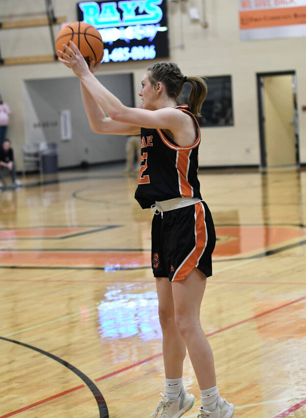 Kaegan Young (22) connects on her third three-pointer of the game late in the fourth quarter. She led all scorers on Monday with 18 points.