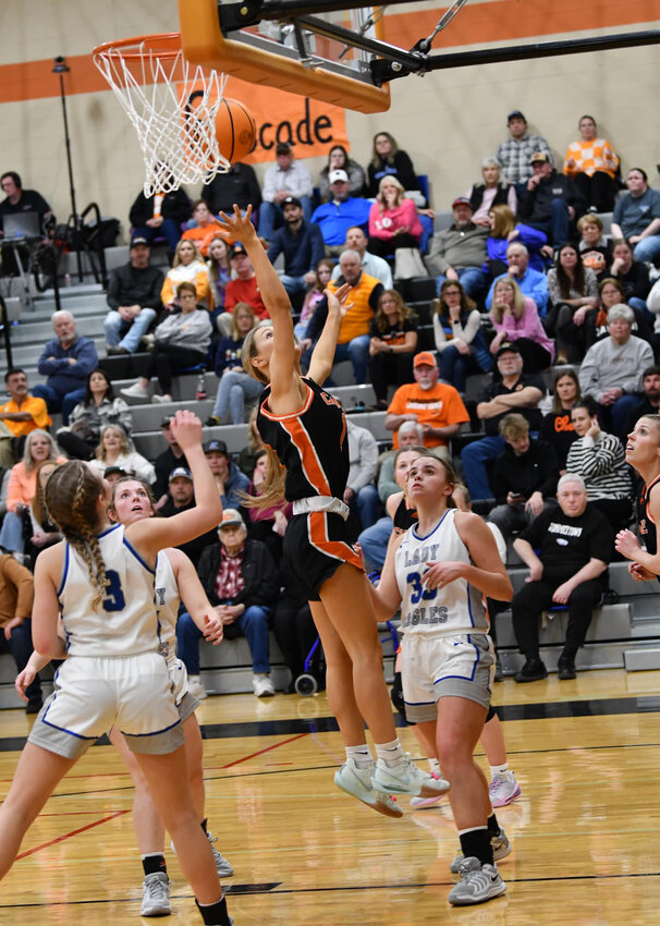 Cascade senior Laina Carter (1) lays in two of her four points in the second half on Monday. She also scored a layup to beat the first-quarter buzzer that gave Cascade a 17-11 lead after the opening period.