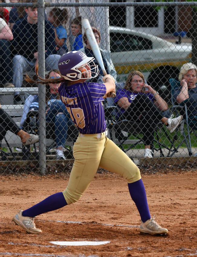 Mattie Maxey (28) launches her fifth round-tripper of the season in Tuesday's win against Cascade.