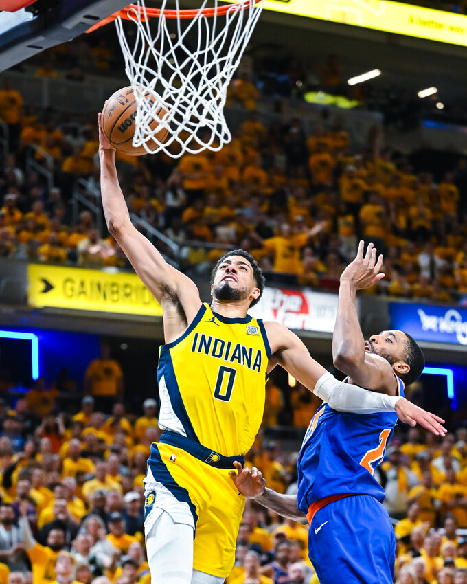 Tyrese Haliburton (0) goes up for a dunk in Game 6 against the Knicks. Haliburton averages 18.8 PPG, 9.8 APG, and 5.7 RPG in the 2025 NBA playoffs, leading the Pacers to their second NBA Finals appearance in franchise history (2000).