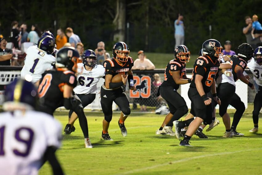 Kaden Hill (6) runs vs Community. Hill returns for his senior season as a key playmaker both at linebacker and at running back.