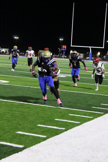 Torrion Mathis (16) fights hard for extra yards. Mathis led all players with a career-high 246 yards rushing to go along with 2 TDs on just 21 carries (11.7 YPC) in Thursday's win.