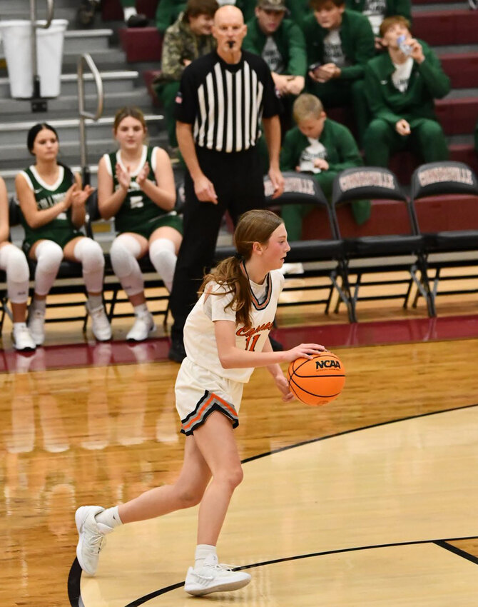 Lizzie Keele (11) drives vs Collinwood. She finished with 14 points, 5 rebounds, and a whopping 6 steals in the win on Monday morning.