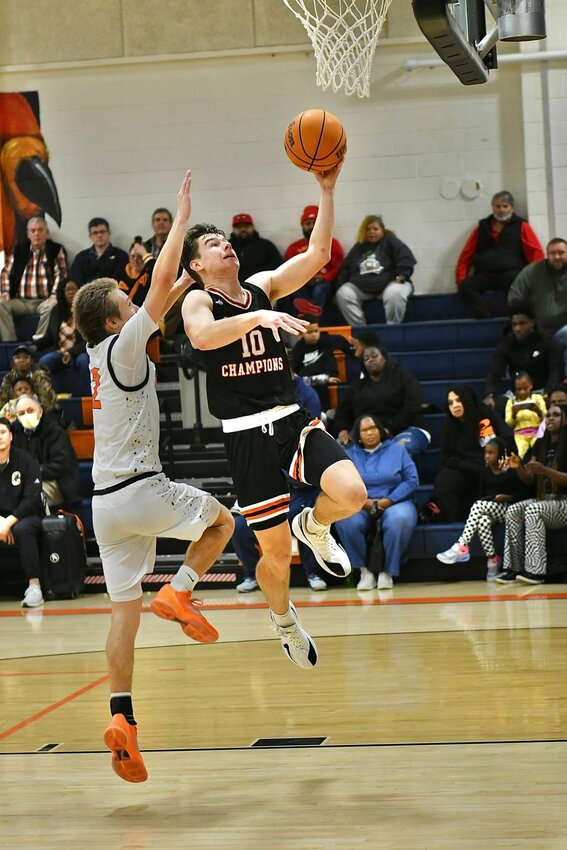 Henry Stone lays in 2 of his season-high 24 points in Friday's win. He added five rebounds, three assists, and three steals in the contest.
