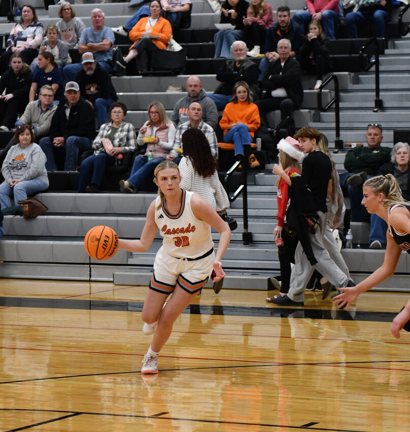 Suzanna Crews (30) drives against Richland on Tuesday. She nearly posted a double-double, finishing with nine points & 10 rebounds with a pair of blocks.
