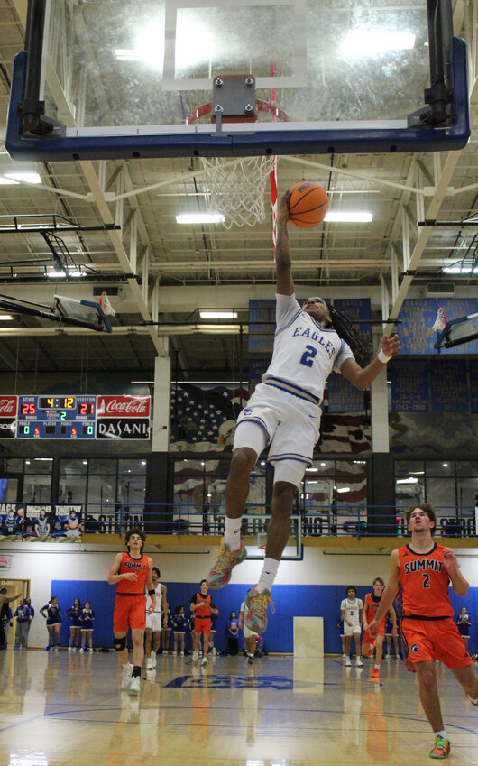 Tommie Cannon (2) lays in two of his 19 points on Thursday night.