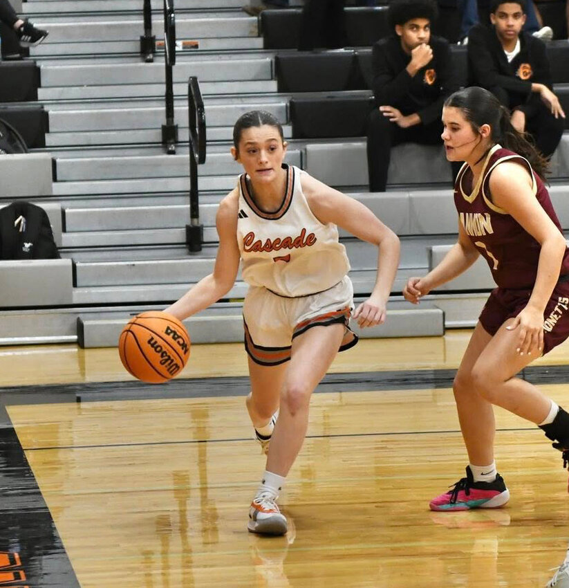 Caroline Parker (5) drives baseline against Cannon County. She finished with 11 points in Friday's win.