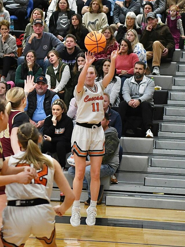 Lizzie Keele (11) fires away from downtown against the Lionettes. Keele finished with 10 points and 7 rebounds in the win on Friday night.