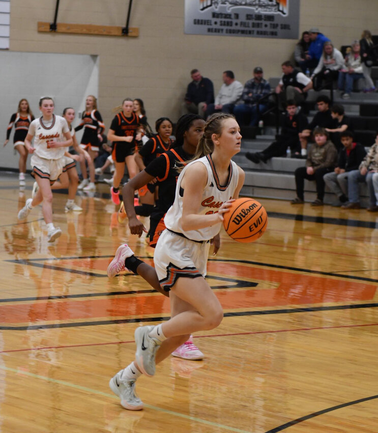 Kaegan Young (22) goes coast-to-coast following a steal for two of her 21 points in Friday's win over Fayetteville City. Young shot 8/10 from the field, pulling down seven rebounds as well as dishing out five assists.