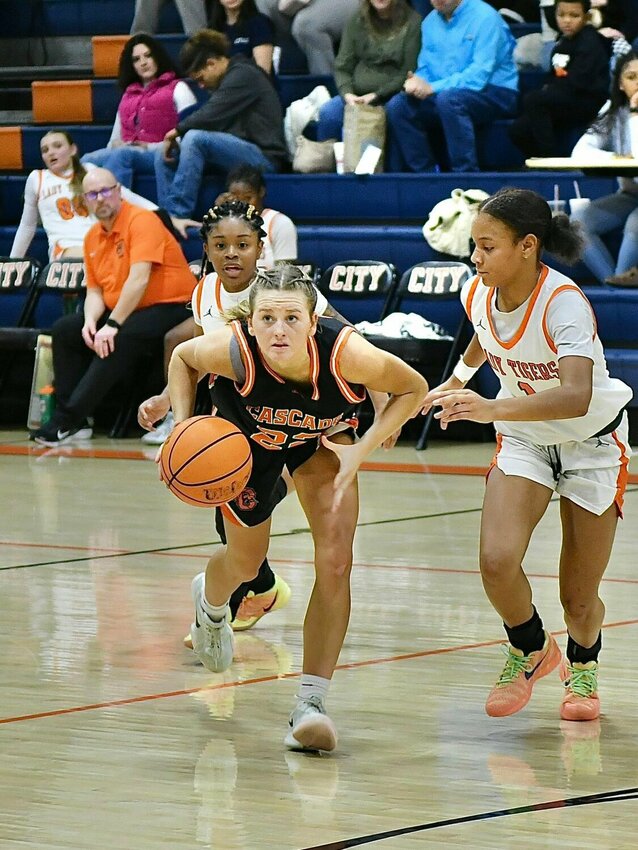 Kaegan Young (22) looks for a pass at Fayetteville City. Young has announced herself as a Class AA Miss Basketball contender this season, averaging a team-high 20.2 PPG on 55/33/77 shooting splits over the last 10 games while leading Cascade to a 9-1 record over that span.