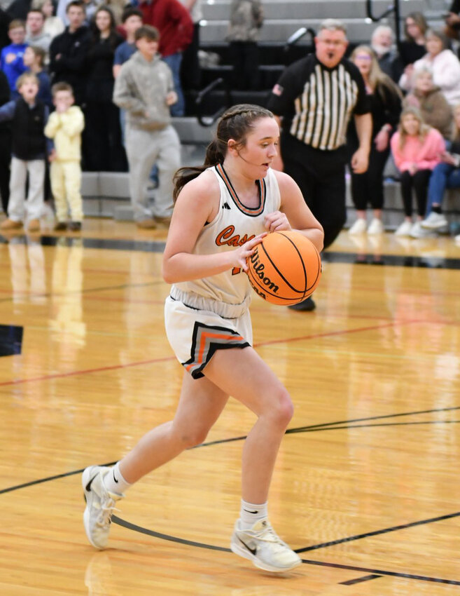 Lexi Comstock (12) leads the fastbreak for her only basket from Friday's win over Chapel Hill. Comstock finished with a game-high 7 assists and 3 steals.