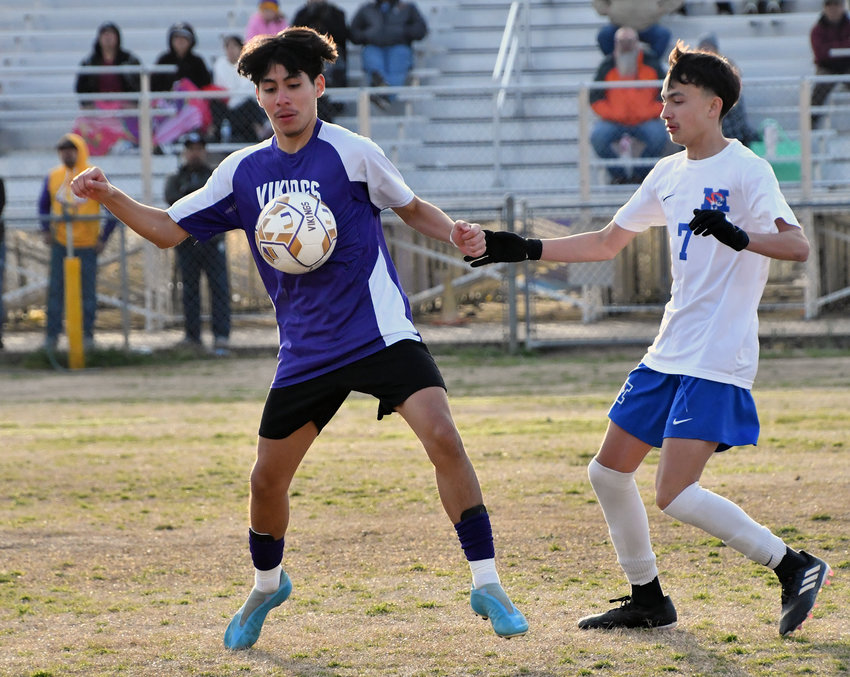 Andrew Montalvo of the Vikings and Imar Pineda (7) of the Tigers battle for the ball.&nbsp;